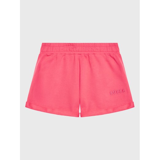 Guess Szorty materiałowe J3GD02 KA6R3 Różowy Regular Fit ze sklepu MODIVO w kategorii Spodenki dziewczęce - zdjęcie 182744224