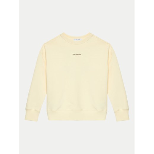 Calvin Klein Jeans Bluza Monogram IB0IB02258 Beżowy Regular Fit ze sklepu MODIVO w kategorii Bluzy chłopięce - zdjęcie 182744251