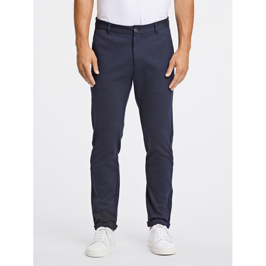 Lindbergh Chinosy 30-01007A Granatowy Slim Fit ze sklepu MODIVO w kategorii Spodnie męskie - zdjęcie 182745862