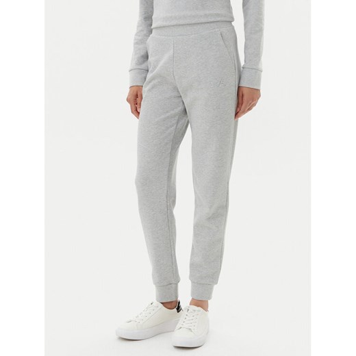 EA7 Emporio Armani Spodnie dresowe 7W000096 AF12473 O8002 Szary Regular Fit ze sklepu MODIVO w kategorii Spodnie damskie - zdjęcie 182746021