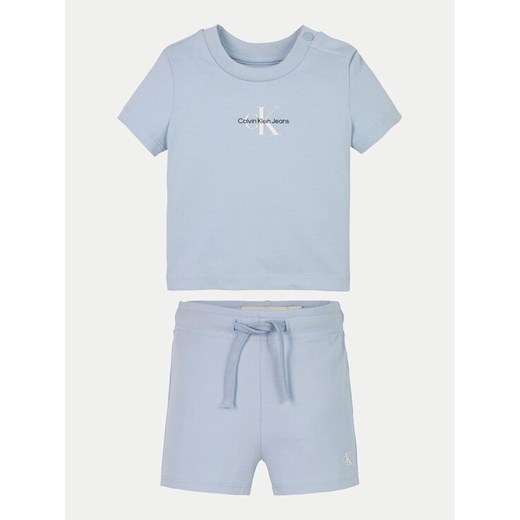Calvin Klein Jeans Komplet t-shirt i spodenki Monogram Logo IN0IN00319 Błękitny Regular Fit ze sklepu MODIVO w kategorii Komplety niemowlęce - zdjęcie 182747031