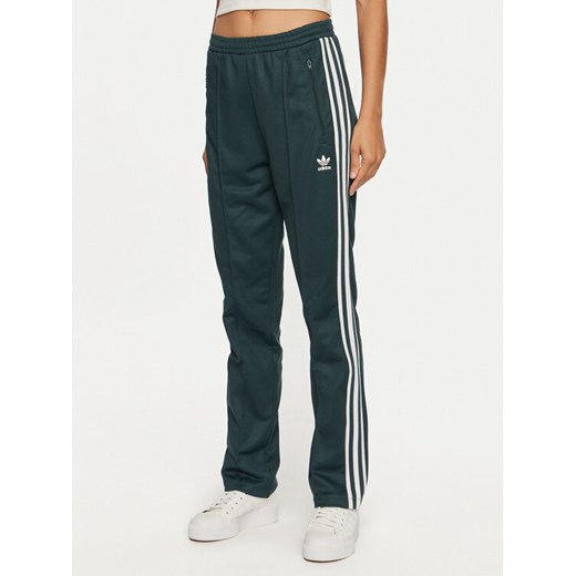 adidas Spodnie dresowe Beckenbauer IY2226 Zielony Regular Fit ze sklepu MODIVO w kategorii Spodnie damskie - zdjęcie 182747961