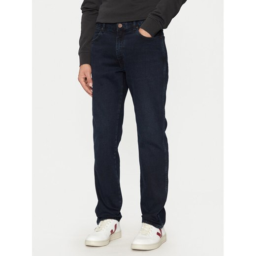 Wrangler Jeansy River 112356837 Granatowy Tapered Fit ze sklepu MODIVO w kategorii Jeansy męskie - zdjęcie 182748021