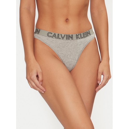 Calvin Klein Underwear Stringi Ultimate 000QD3636E Szary ze sklepu MODIVO w kategorii Majtki damskie - zdjęcie 182748414