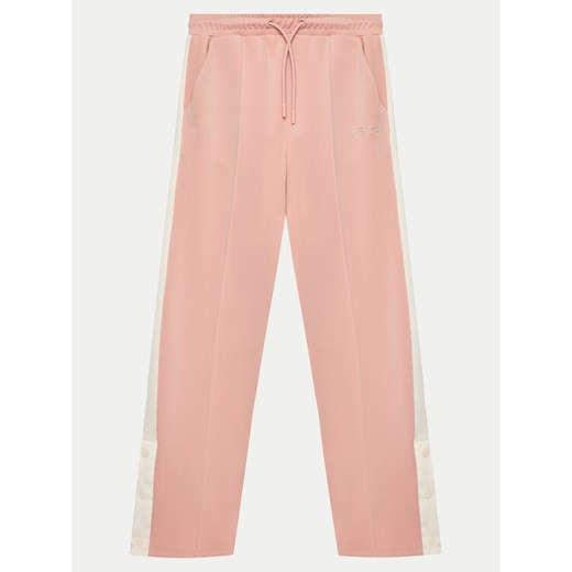Guess Spodnie dresowe J5RB10 KCO72 Różowy Regular Fit ze sklepu MODIVO w kategorii Spodnie damskie - zdjęcie 182748824