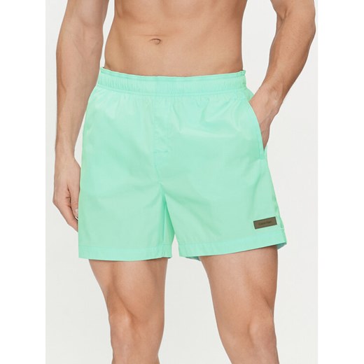 Calvin Klein Swimwear Szorty kąpielowe KM0KM00939 Niebieski Regular Fit ze sklepu MODIVO w kategorii Kąpielówki - zdjęcie 182749712