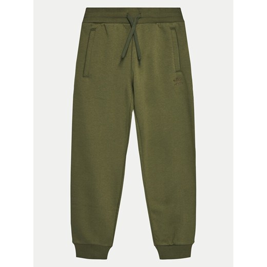 adidas Spodnie dresowe Boyfriend IX7645 Zielony Loose Fit ze sklepu MODIVO w kategorii Spodnie chłopięce - zdjęcie 182749791