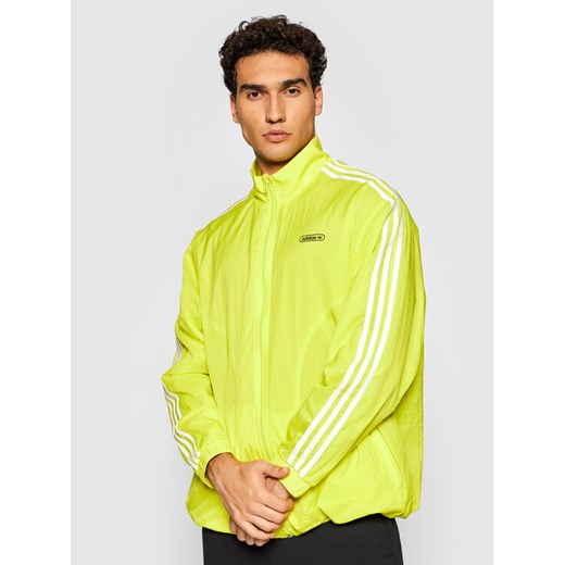 adidas Kurtka przejściowa Reverse Track GN3818 Żółty Regular Fit ze sklepu MODIVO w kategorii Kurtki męskie - zdjęcie 182750973
