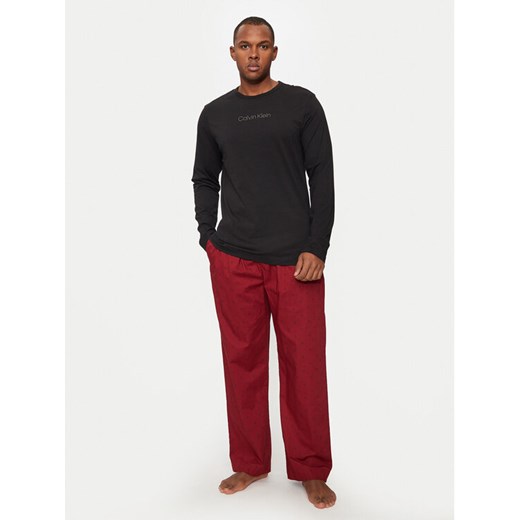 Calvin Klein Underwear Spodnie piżamowe 000NM2781E Czerwony Relaxed Fit ze sklepu MODIVO w kategorii Piżamy męskie - zdjęcie 182752322