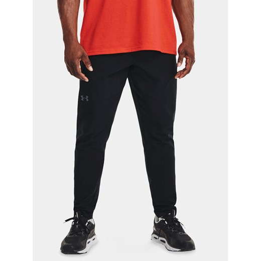 Under Armour Spodnie dresowe Ua Unstoppable Tapered Pants 1352028-001 Czarny Fitted Fit ze sklepu MODIVO w kategorii Spodnie męskie - zdjęcie 182752724
