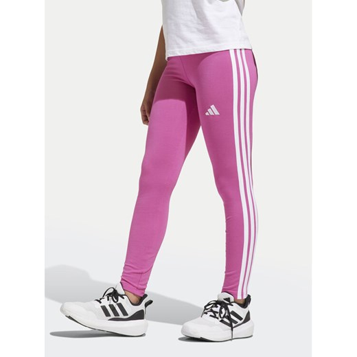 adidas Legginsy Essentials JJ3450 Różowy Slim Fit ze sklepu MODIVO w kategorii Spodnie dziewczęce - zdjęcie 182753561