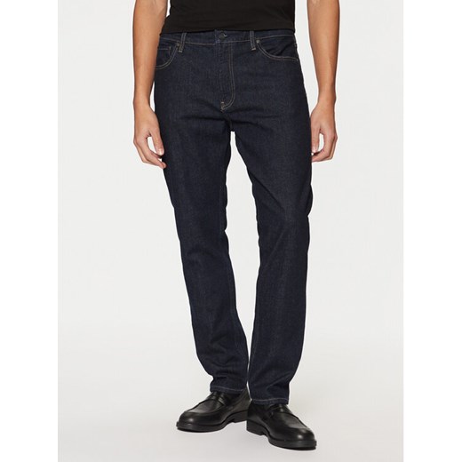 Calvin Klein Jeansy K10K113983 Granatowy Tapered Fit ze sklepu MODIVO w kategorii Jeansy męskie - zdjęcie 182754352