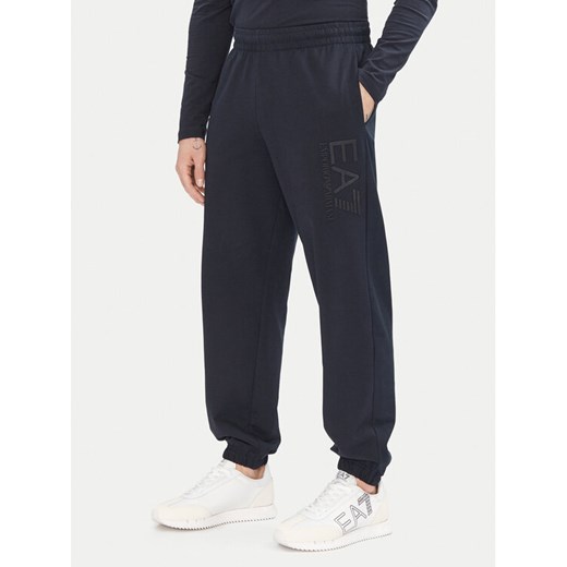 EA7 Emporio Armani Spodnie dresowe 7M000233 AF13512 UB102 Granatowy Regular Fit ze sklepu MODIVO w kategorii Spodnie męskie - zdjęcie 182755164