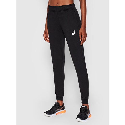 Asics Spodnie dresowe Big Logo 2032A982 Czarny Regular Fit ze sklepu MODIVO w kategorii Spodnie damskie - zdjęcie 182755220