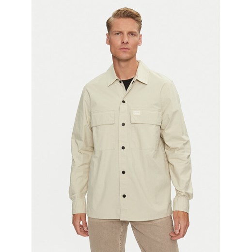 Calvin Klein Jeans Koszula Cargo J30J326970 Beżowy Regular Fit ze sklepu MODIVO w kategorii Koszule męskie - zdjęcie 182755493
