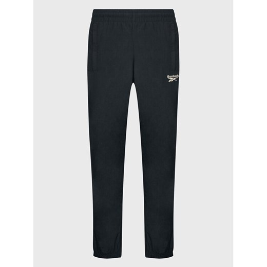 Reebok Spodnie dresowe Vector HK7077 Czarny Slim Fit ze sklepu MODIVO w kategorii Spodnie męskie - zdjęcie 182755822