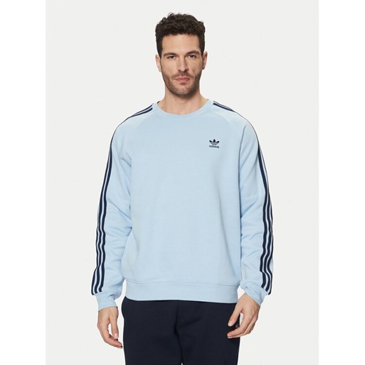 adidas Bluza adicolor Classics 3-Stripes JN7026 Błękitny Regular Fit ze sklepu MODIVO w kategorii Bluzy męskie - zdjęcie 182756523