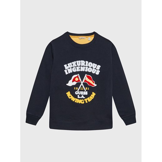 Guess Bluza L3RQ01 KBLB0 Niebieski Regular Fit ze sklepu MODIVO w kategorii Bluzy chłopięce - zdjęcie 182756682
