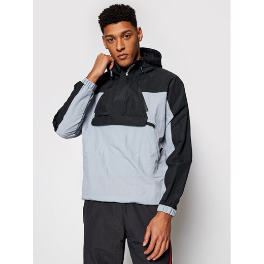 adidas Kurtka anorak Adventure Mishmash Blocked GN2329 Czarny Regular Fit ze sklepu MODIVO w kategorii Kurtki męskie - zdjęcie 182759643