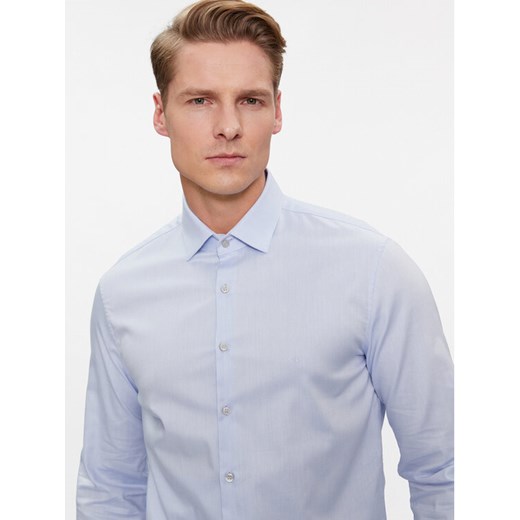 Calvin Klein Koszula K10K108426 Niebieski Slim Fit ze sklepu MODIVO w kategorii Koszule męskie - zdjęcie 182760343