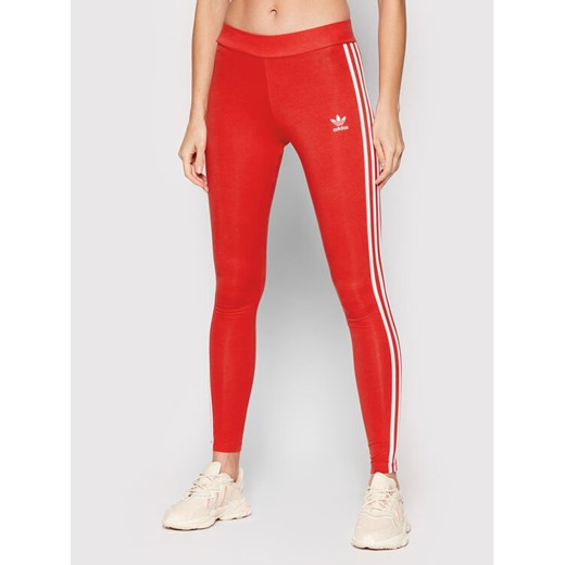 adidas Legginsy adicolor Classics 3-Stripes HD2348 Czerwony Tight Fit ze sklepu MODIVO w kategorii Spodnie damskie - zdjęcie 182761731