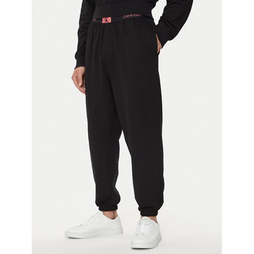 Calvin Klein Underwear Spodnie piżamowe 000NM2393E Czarny Regular Fit ze sklepu MODIVO w kategorii Piżamy męskie - zdjęcie 182762074