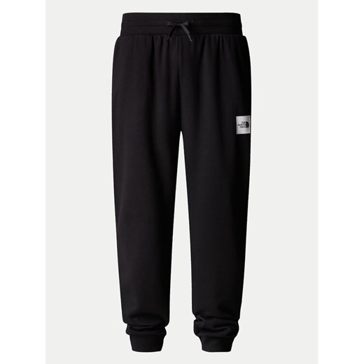 The North Face Spodnie dresowe Fine NF0A8C1K Czarny Tapered Fit ze sklepu MODIVO w kategorii Spodnie męskie - zdjęcie 182762291
