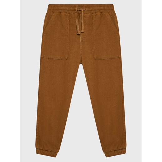 United Colors Of Benetton Joggery 459TCF012 Brązowy Regular Fit ze sklepu MODIVO w kategorii Spodnie chłopięce - zdjęcie 182762304