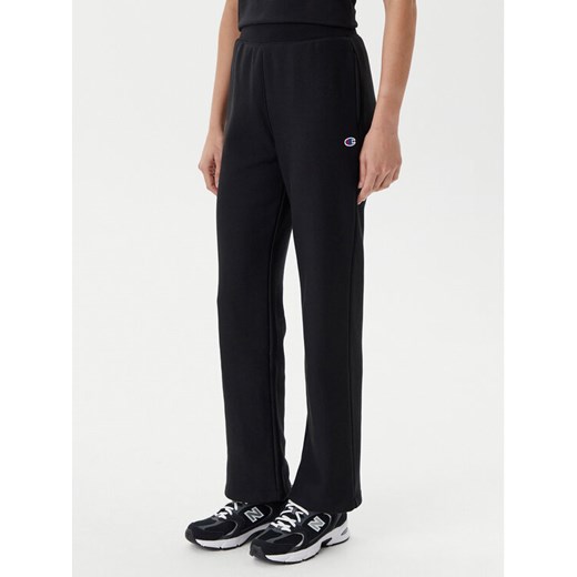 Champion Spodnie dresowe 117983 Czarny Slim Fit ze sklepu MODIVO w kategorii Spodnie damskie - zdjęcie 182763132