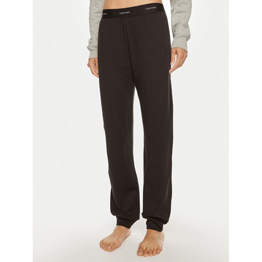 Calvin Klein Underwear Spodnie dresowe 000QS7271E Czarny Regular Fit ze sklepu MODIVO w kategorii Spodnie damskie - zdjęcie 182763513