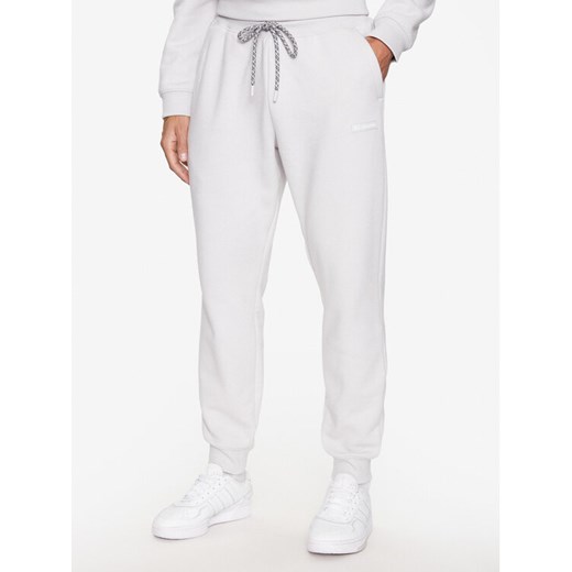 Columbia Spodnie dresowe Marble Canyon™ Heavyweight Fleece Pant Szary Regular Fit ze sklepu MODIVO w kategorii Spodnie męskie - zdjęcie 182763602
