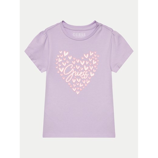 Guess T-Shirt K4GI03 K6YW4 Fioletowy Regular Fit ze sklepu MODIVO w kategorii Bluzki dziewczęce - zdjęcie 182763912