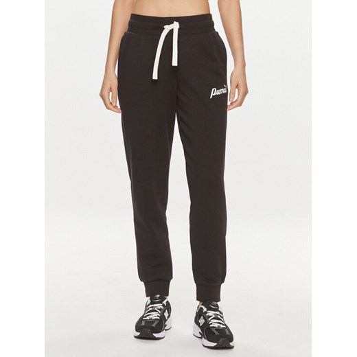 Puma Spodnie dresowe Ess+ Script 679350 Czarny Regular Fit ze sklepu MODIVO w kategorii Spodnie damskie - zdjęcie 182763961