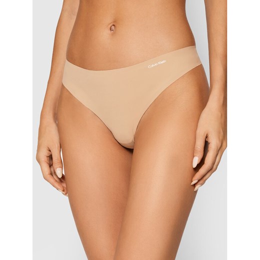 Calvin Klein Underwear Stringi 0000D3428E Beżowy ze sklepu MODIVO w kategorii Majtki damskie - zdjęcie 182764092