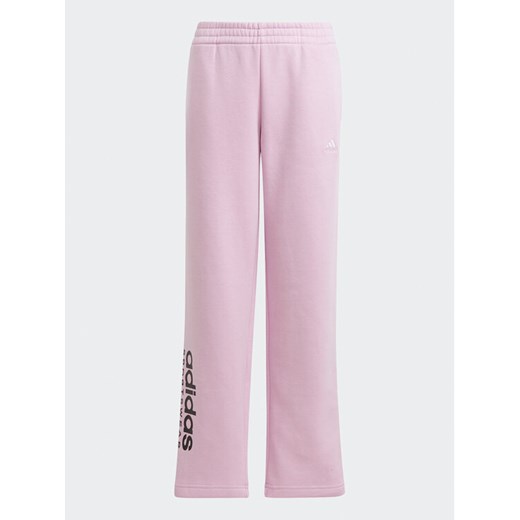 adidas Spodnie dresowe Fleece Kids IJ5953 Różowy Loose Fit ze sklepu MODIVO w kategorii Spodnie dziewczęce - zdjęcie 182766051