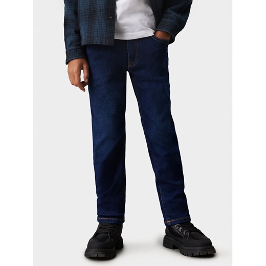 Calvin Klein Jeans Jeansy Authentic IB0IB02188 Granatowy Regular Fit ze sklepu MODIVO w kategorii Spodnie chłopięce - zdjęcie 182767052