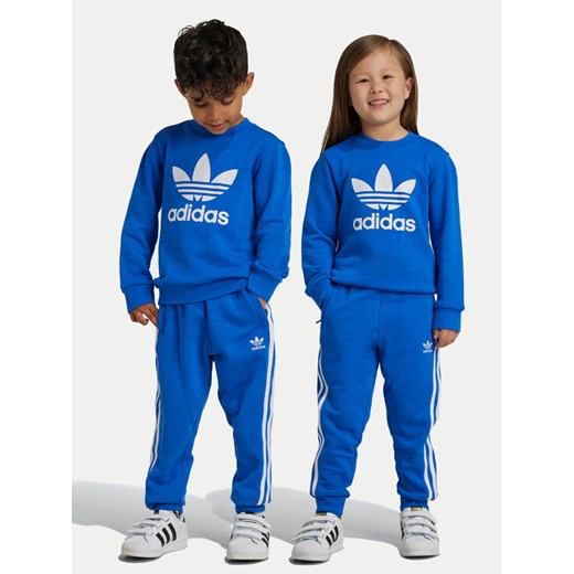 adidas Dres adicolor IY4782 Niebieski Regular Fit ze sklepu MODIVO w kategorii Dresy chłopięce - zdjęcie 182767062