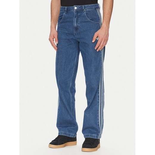 adidas Jeansy adicolor Denim Firebird JC6234 Niebieski Straight Fit ze sklepu MODIVO w kategorii Jeansy męskie - zdjęcie 183578243