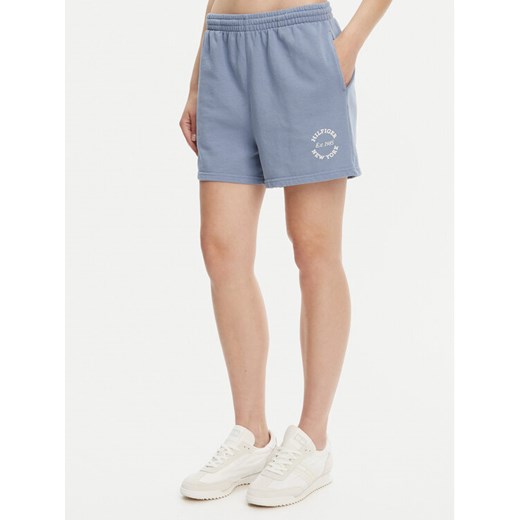 Tommy Hilfiger Szorty sportowe UW0UW05794 Niebieski Regular Fit ze sklepu MODIVO w kategorii Szorty - zdjęcie 183591371