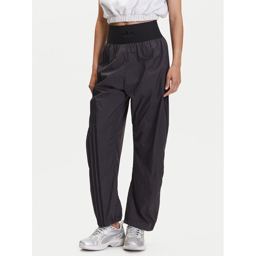 adidas Spodnie dresowe JJ0920 Szary Loose Fit ze sklepu MODIVO w kategorii Spodnie damskie - zdjęcie 183631613