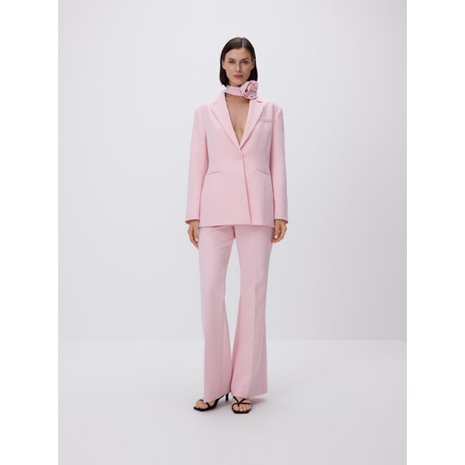 Reserved - Spodnie z kantem - pastelowy róż Reserved XS Reserved