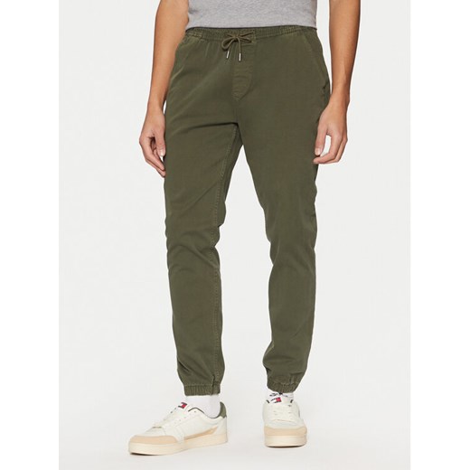 Tommy Jeans Joggery Austin DM0DM20283 Zielony Slim Fit Tommy Jeans 36_32 MODIVO