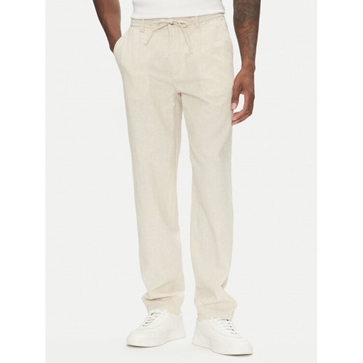 Lindbergh Spodnie materiałowe 30-003030 Beżowy Relaxed Fit ze sklepu MODIVO w kategorii Spodnie męskie - zdjęcie 183653124