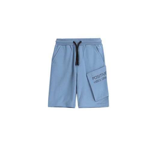 Coccodrillo Szorty sportowe WC5120501VBC Niebieski Regular Fit ze sklepu MODIVO w kategorii Spodenki chłopięce - zdjęcie 183683862