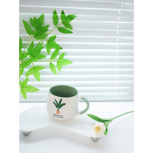 Sinsay - Porcelanowy kubek z ozdobnym nadrukiem - zielony Sinsay One Size Sinsay