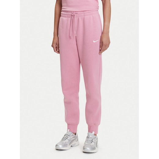 Nike Spodnie dresowe Sportswear Phoenix Fleece FZ7626 Różowy Regular Fit ze sklepu MODIVO w kategorii Spodnie damskie - zdjęcie 183689091