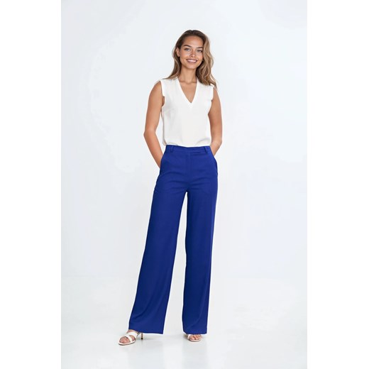 Spodnie bootcut z kieszeniami - indygo ze sklepu Cudmoda w kategorii Spodnie damskie - zdjęcie 183696380