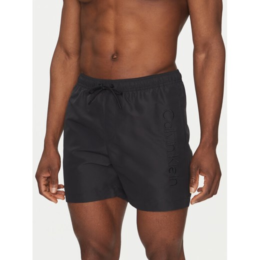 Calvin Klein Swimwear Szorty kąpielowe KM0KM01166 Czarny Regular Fit ze sklepu MODIVO w kategorii Kąpielówki - zdjęcie 183737184