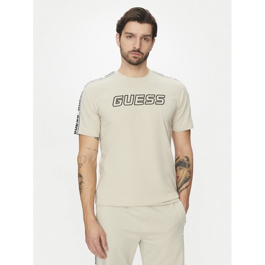 Guess T-Shirt Z4GI18 J1314 Beżowy Regular Fit ze sklepu MODIVO w kategorii T-shirty męskie - zdjęcie 183778742