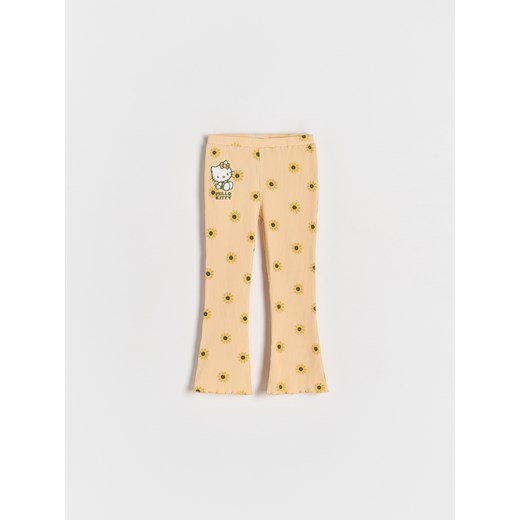 Reserved - Prążkowane legginsy Hello Kitty - brzoskwiniowy ze sklepu Reserved w kategorii Spodnie dziewczęce - zdjęcie 183783281